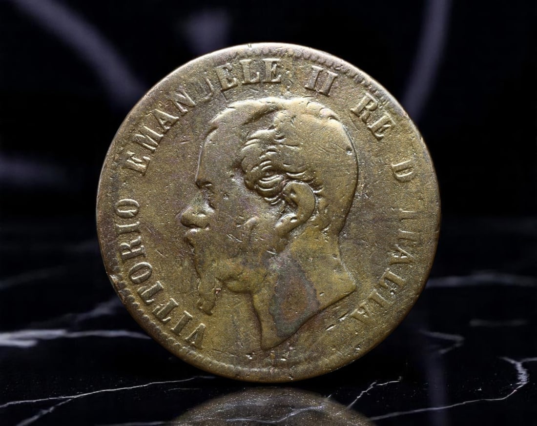 ITALY: Vittorio Emanuele II - National Unity Bronze 10 Centesimi Coin, 1863 M Milan Mint, 30mm: Issued in the critical years following Italy's unification, this 1863 bronze 10 Centesimi coin bears the commanding profile of King Vittorio Emanuele II, Italy's first monarch under a unified crown. T