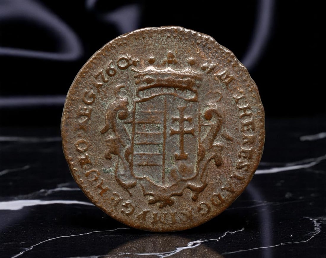 HUNGARY: Maria Theresa - Sacred Heart Denar Coin, 1760, 22mm: Struck under the reign of Maria Theresa, this 1760 Hungarian Denar presents a deeply spiritual and heraldic blend of imperial piety and dynastic authority. The obverse bears the radiant Sacred Heart, 