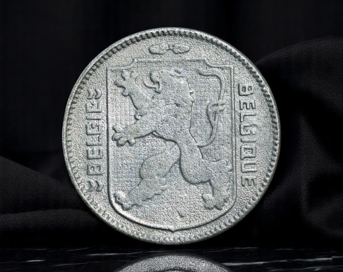 BELGIUM: National Unity - Heraldic Lion 1 Franc Coin, 1944, 21mm: Struck during the tumultuous final year of World War II, this 1944 Belgian 1 Franc coin embodies a defiant national identity. The reverse showcases a crowned monogram ''1 F'' above a stylized anchor b