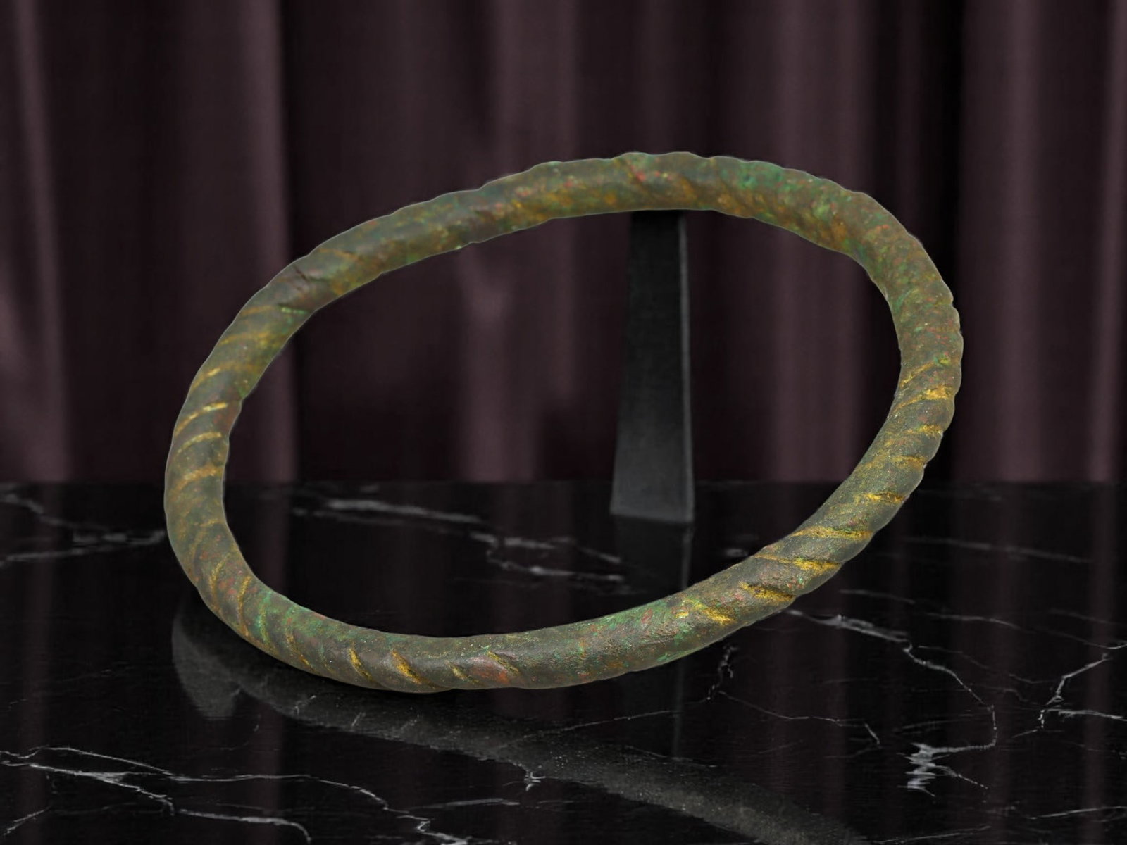 CELTIC Bronze Bracelet - Deep Spiral-Twist Band, Closed Circular Form (7.5 cm): This substantial Celtic bracelet exhibits a robust circular profile defined by a deeply incised spiral-twist along its entire outer band. The piece bears a mottled green patina with golden undertones,