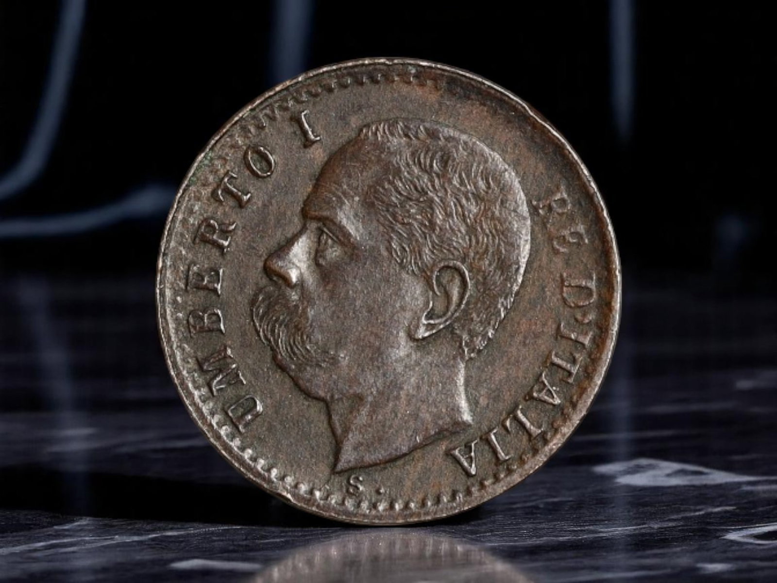 ITALY: Umberto I - Royal Authority 1 Centesimo Coin, 1900 R Rome Mint, 15mm: Struck during the final year of Umberto I's reign, this 1 Centesimo coin captures a monarch at the precipice of dramatic historical change. The obverse presents a firm, right-facing portrait of King U