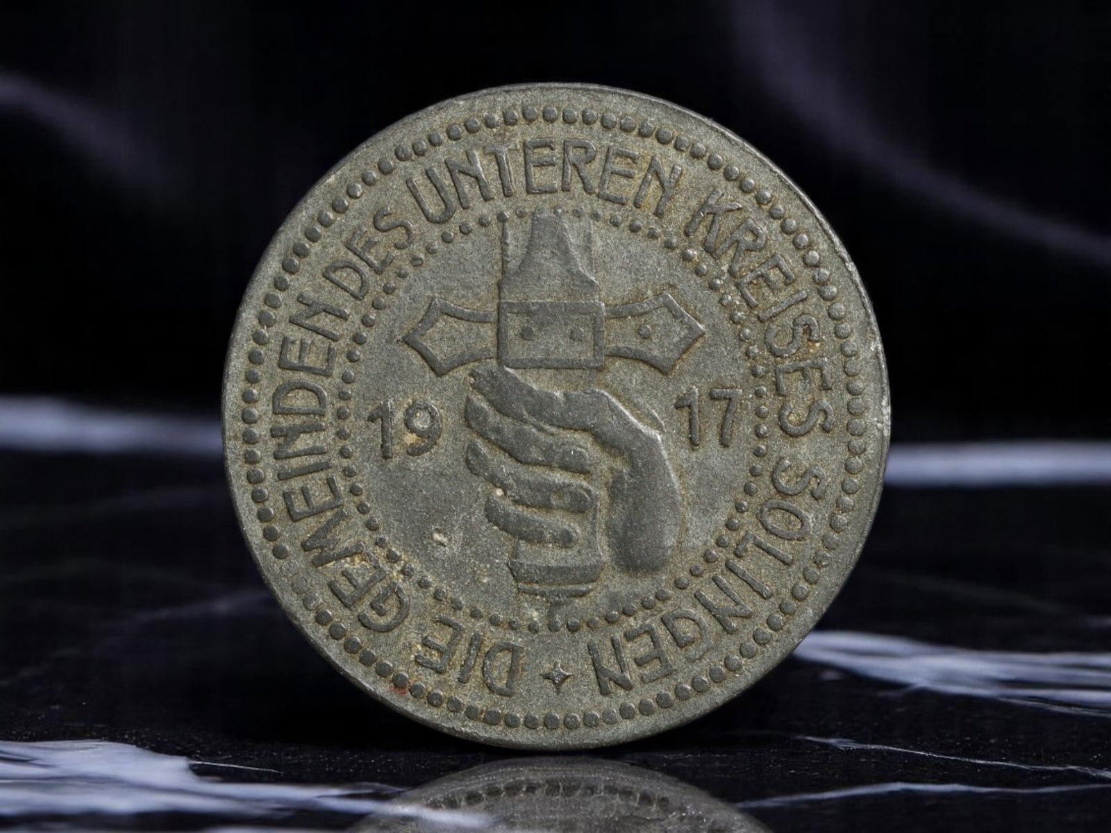 GERMANY/WWI: Solingen District - Allied Municipal 50 Pfennig Kriegsgeld Coin, 1917, 25mm: Struck in 1917 by the united communities of the Solingen district amid Germany's wartime currency crisis, this 50 Pfennig Kriegsgeld coin stands out for its iconographic boldness and cooperative prove