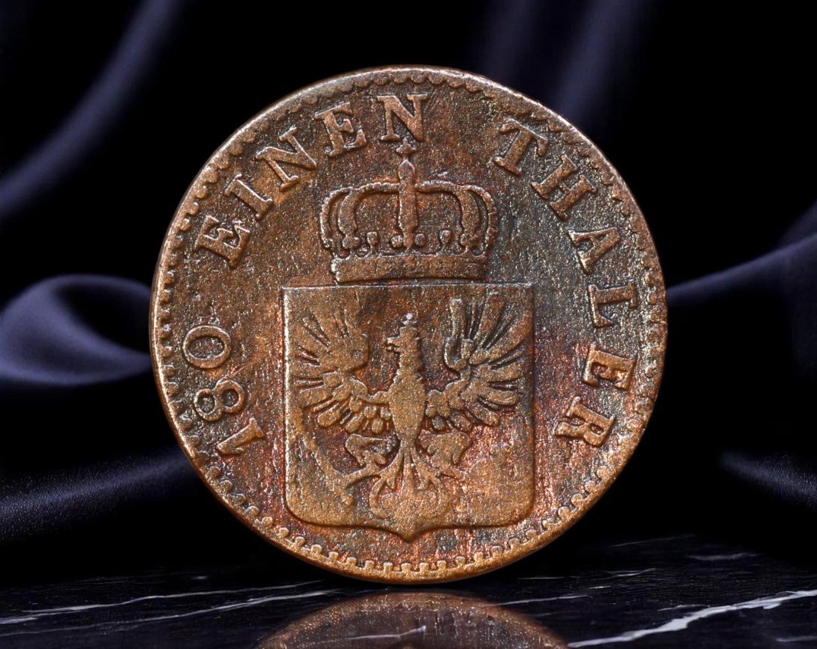 GERMAN STATES/PRUSSIA: Royal Armorial - 2 Pfennige Coin, 1851 A Berlin Mint, 20mm: Issued during a pivotal moment in Prussia's economic consolidation, this 1851 copper 2 Pfennige coin reflects the rise of a new German order under Prussian stewardship. The crowned Prussian eagle embl