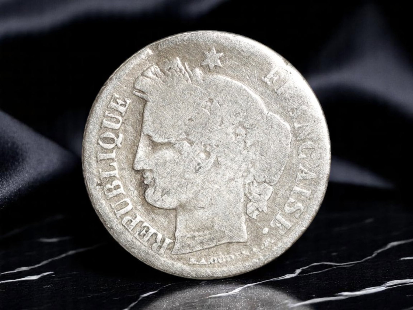 FRANCE: Republican Liberty - Second Republic Silver 20 Centimes Coin, 1850 A Paris Mint, 18mm: Issued during the ephemeral yet fervent Second Republic, this 1850 silver 20 Centimes coin reflects the political idealism and civic virtue that surged through France in the wake of the 1848 revolutio