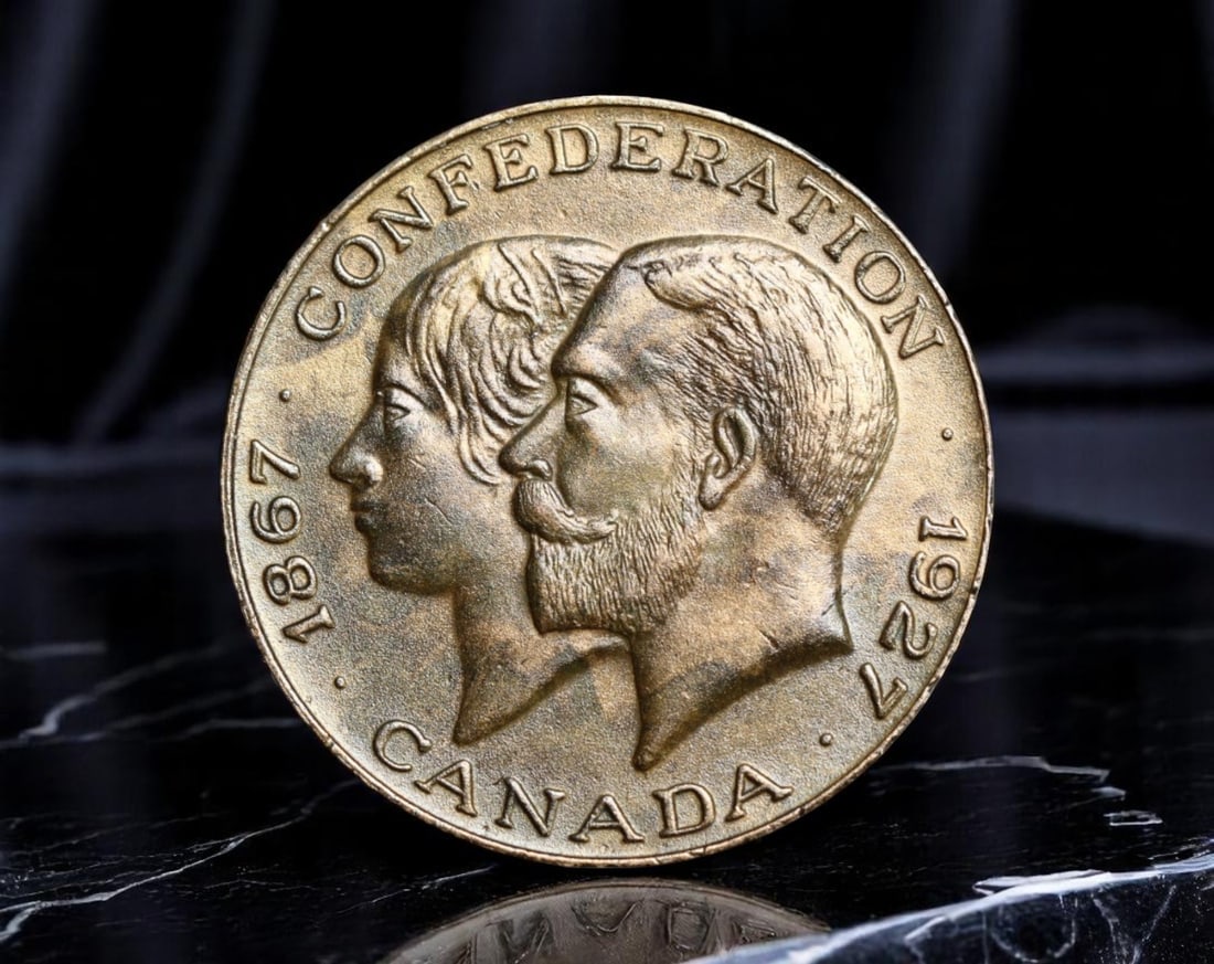 CANADA: George V - Bronze Confederation Centennial Medal, 1867-1927 (25mm, 6.2g): Issued in 1927 to commemorate the 60th anniversary of Canadian Confederation, this 25mm bronze medal showcases a striking dual portrait design. The obverse features conjoined busts symbolizing the uni