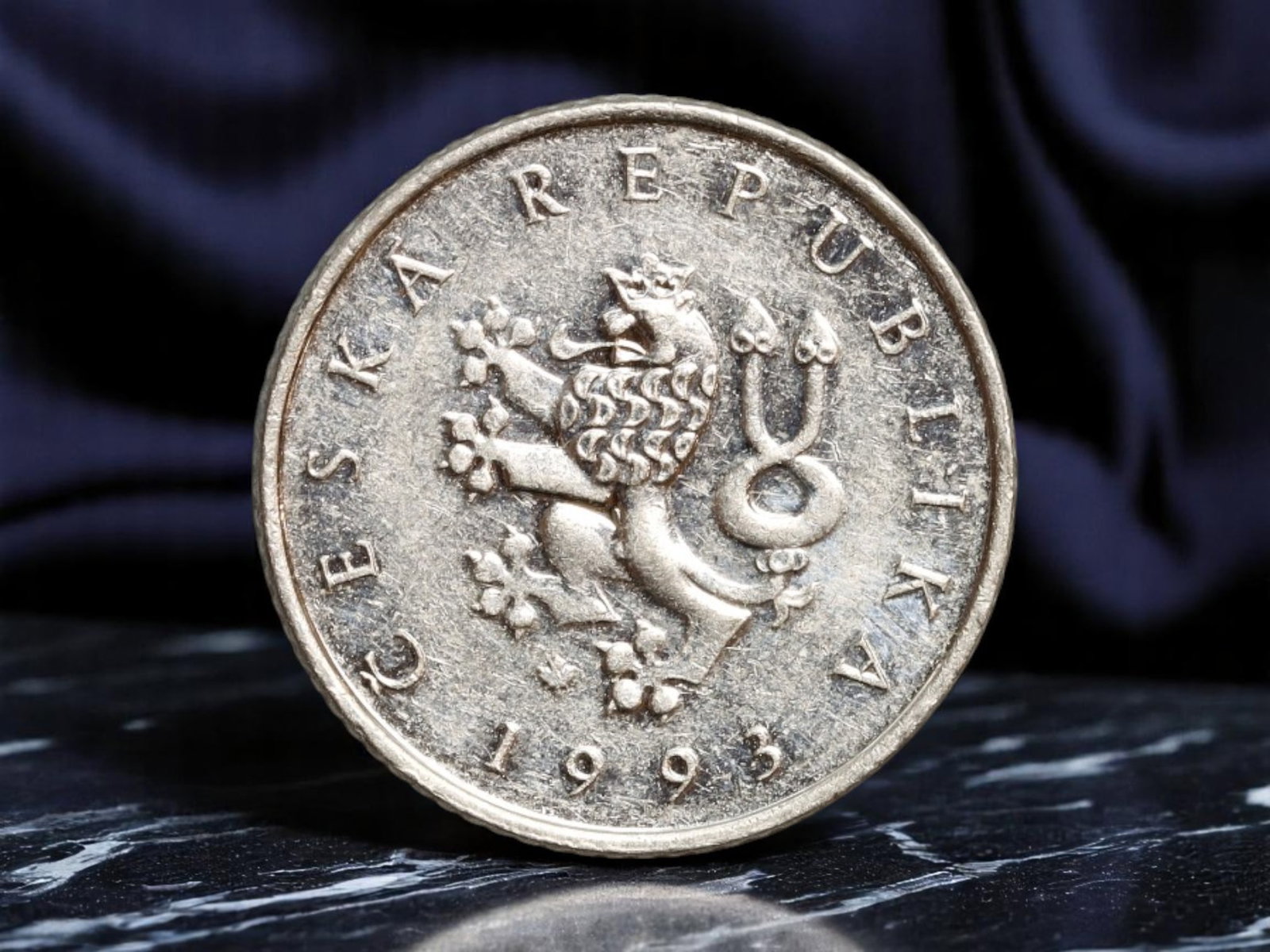 CZECH REPUBLIC: National Rebirth - Crowned Lion 1 Koruna Coin, 1993, 20mm: Issued in the inaugural year of the Czech Republic's post-Czechoslovak independence, this 1993 1 Koruna coin stands as a bold proclamation of sovereignty and heritage. The obverse features the crowned