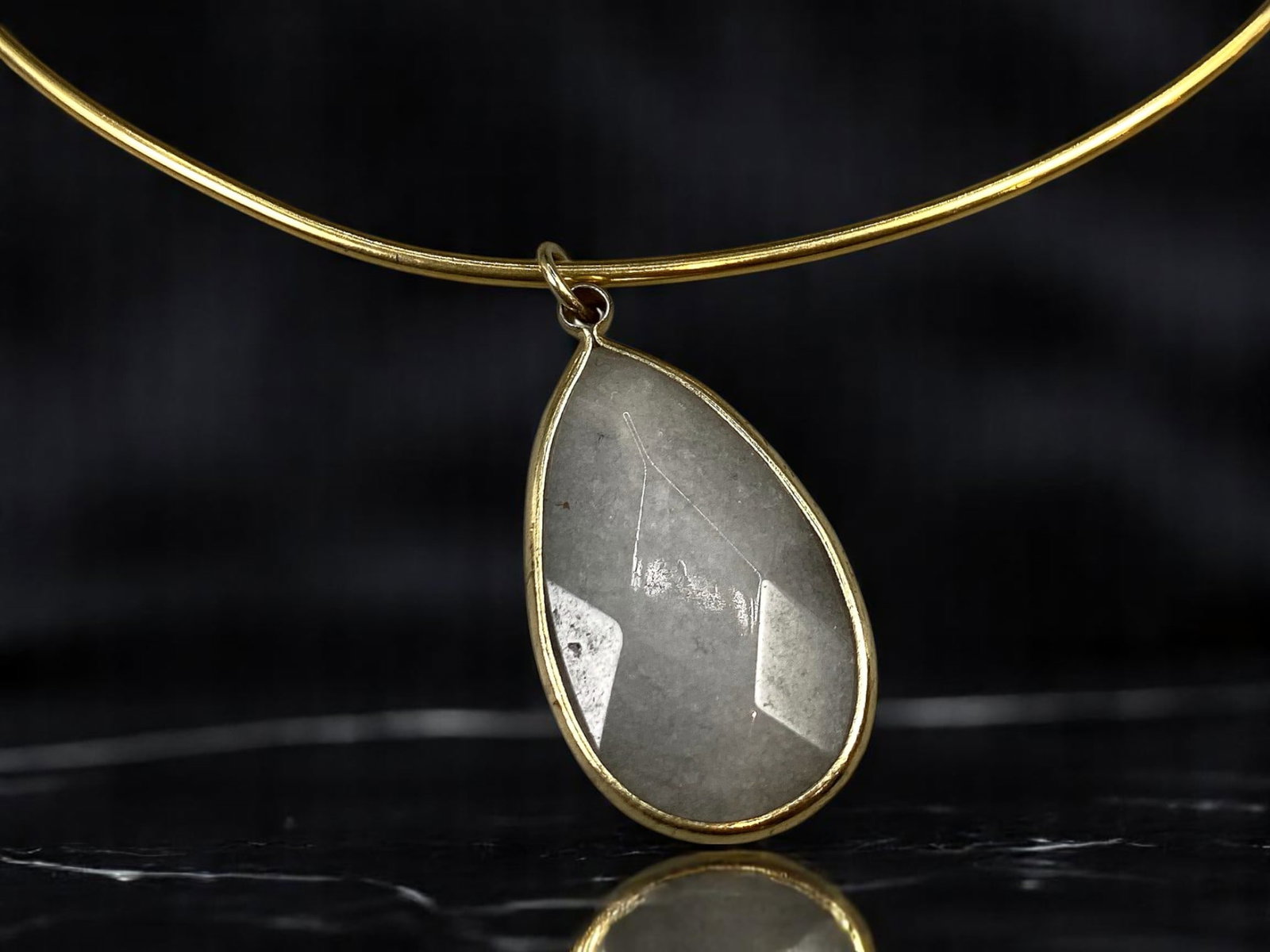 Neck Torc - Goldtone Collar, Quartz-Like Teardrop Pendant 12cm Diameter: From an estate jewelry collection, this artistic modern neck torc offers bold minimalism with a sculptural edge. The rigid goldtone collar circles the neck in a sleek silhouette, accented by a large, 