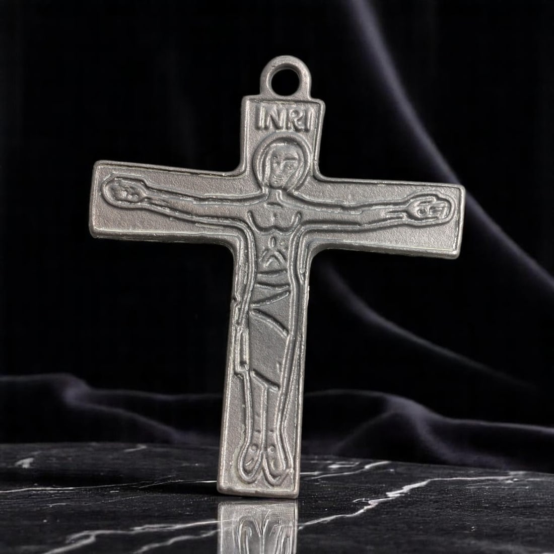 Pendant - Cast Metal Crucifix with INRI & "Christ Is Counting On You" Inscription, 5 x 4 cm: A bold and evocative vintage mid-century pendant featuring a stylized cast metal crucifix design. The front displays an abstracted depiction of Christ with the inscription "INRI" at the top of the cro