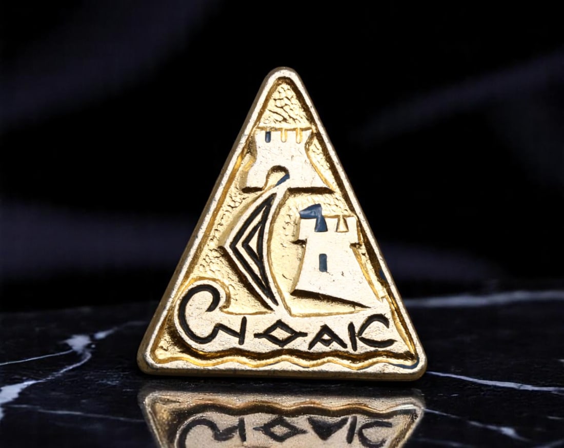 USSR: Sudak - Fortress and Sail Commemorative Badge, circa 1970s, 22mm: This distinctive triangular badge, measuring 22mm, captures the silhouette of the ancient Sudak Fortress rising boldly along the Black Sea coast. The stylized sail and fortress motif embodies the mari