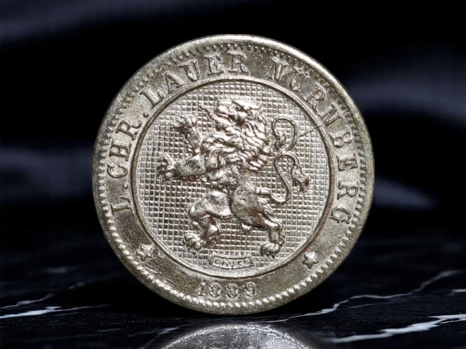 GERMANY: Lauer Nurnberg - Heraldic Lion 5 Centimes Toy Coin, 1889, 12mm (1 of 2)