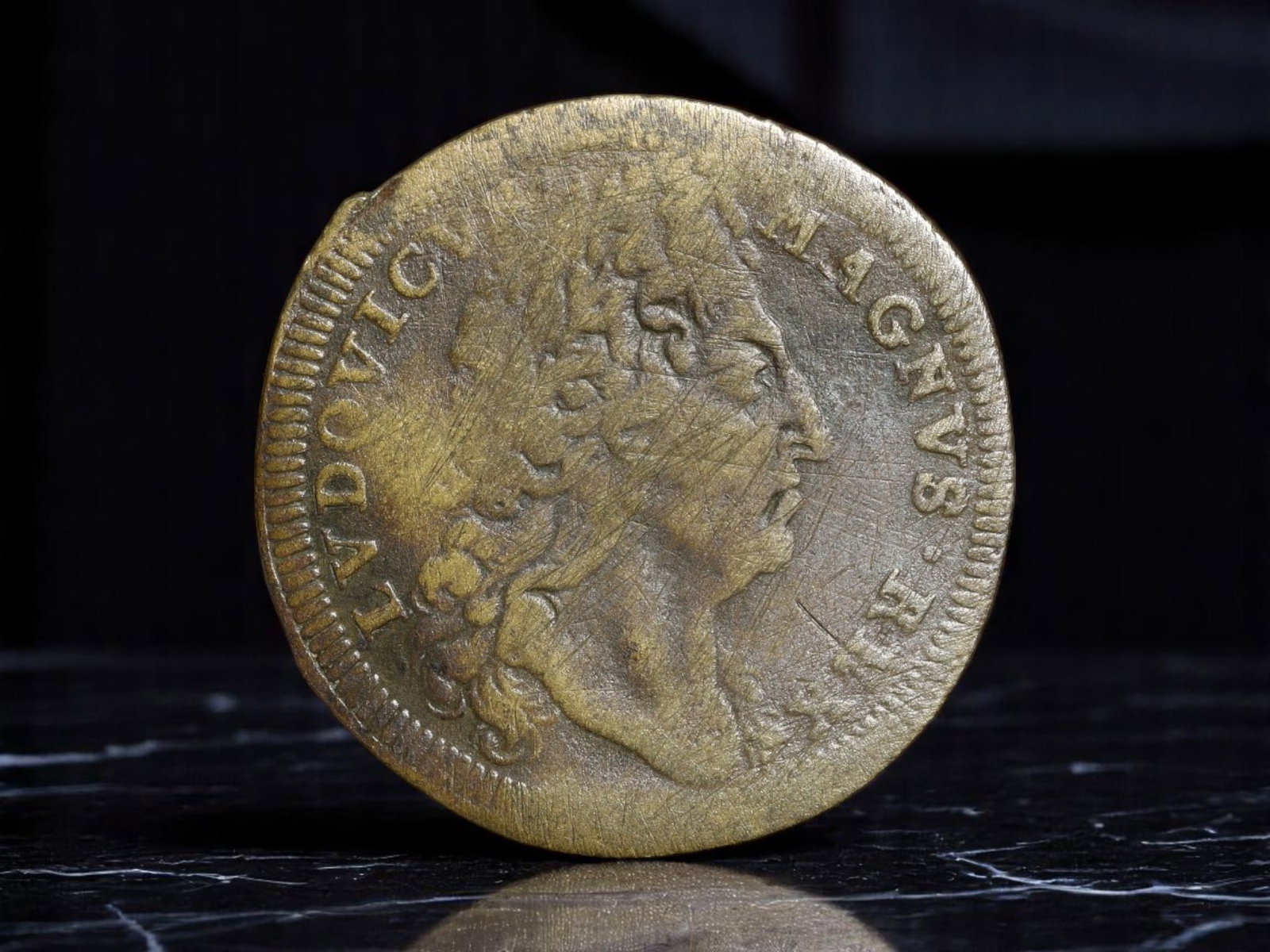 FRANCE: Louis XIV the Sun King - Royal Authority Jeton, c. Late 17th Century, 25mm: Struck in the twilight decades of Louis XIV's long and centralized reign, this royal jeton is a medallion of absolutist grandeur. The obverse features a classically styled bust of Louis XIV-LVDOVICVS 