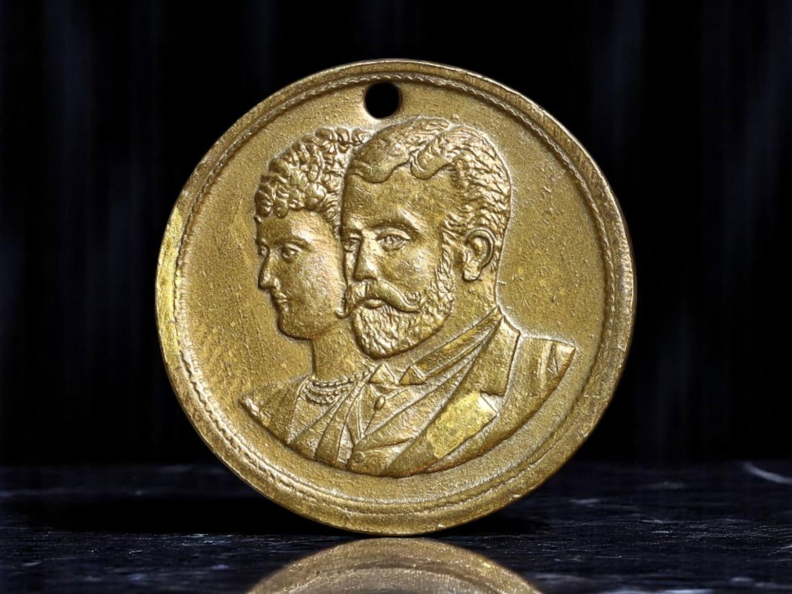 UNITED KINGDOM: Royal Marriage of the Duke of York and Princess May Commemorative Medal, 1893, 19mm: Struck in 1893 to commemorate the union of the Duke of York (later King George V) and Princess May of Teck (later Queen Mary), this brass medal captures the romantic and dynastic significance of a piv