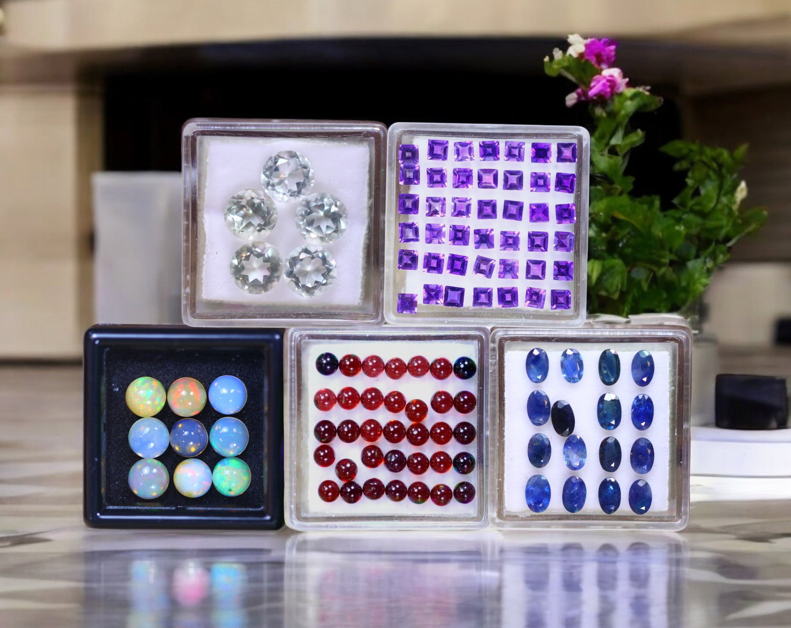 Royal Spectrum - Amethyst, Opal, Rhodolite Garnet, Blue Sapphire, and Green Amethyst Collection: This striking layout is a gemstone kaleidoscope-balancing architectural precision with organic play-of-light. At its heart, forty-two calibrated Amethysts (3.97ct, 2.7 x 2.7 x 1.8 mm) in square step c