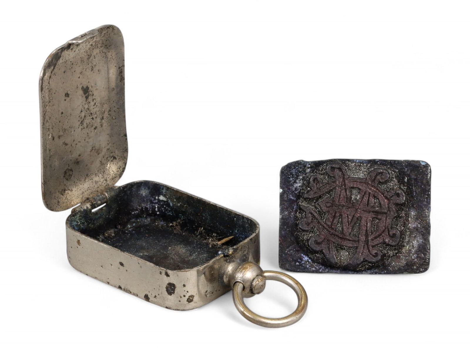 VICTORIAN-STYLE Silver Locket Pendant - Floral Engraving with Hidden Seal (15g, 3x2.2cm): A fascinating object of layered functionality and bygone craftsmanship, this rectangular silvertone locket pendant features a lightly engraved floral motif and opens to reveal a fully intact interior