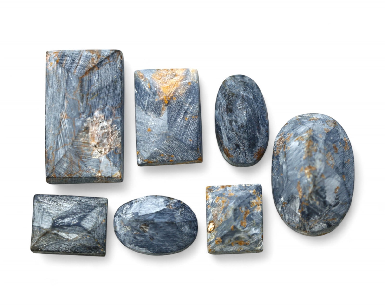 NAMIBIAN PIETERSITE: Preform Cabochon Lot - Rough with Chatoyant Blue-Grey Swirls (Avg. 10-15mm): A dramatic selection of pre-shaped Pietersite cabochon rough, sourced from Namibia and exhibiting the signature stormy swirls and fibrous chatoyance of this rare quartz variant. These polished preform