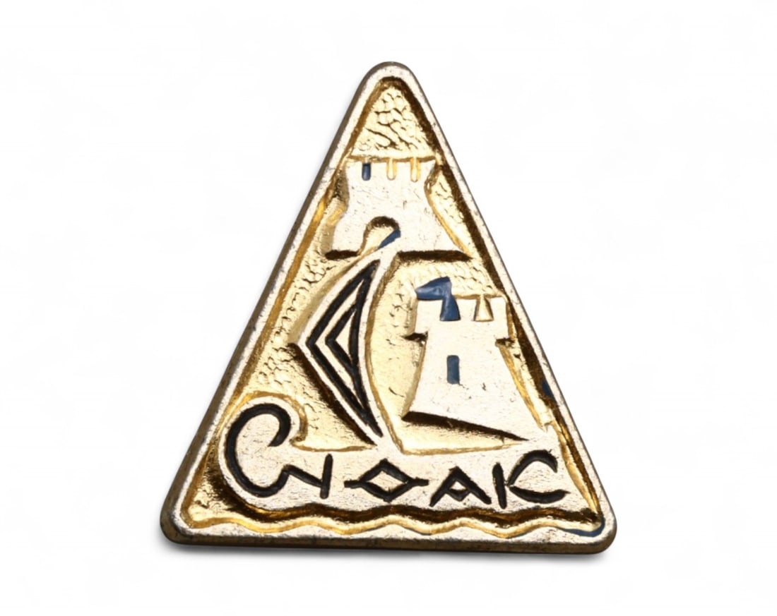 USSR: Sudak - Fortress and Sail Commemorative Badge, circa 1970s, 22mm: This distinctive triangular badge, measuring 22mm, captures the silhouette of the ancient Sudak Fortress rising boldly along the Black Sea coast. The stylized sail and fortress motif embodies the mari