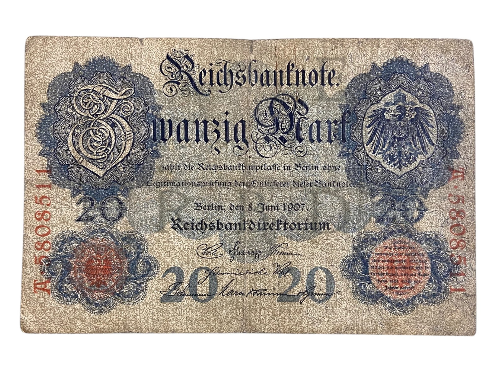 GERMANY: Imperial Authority - Reichsbank 20 Mark Banknote, 1907: This intricately executed 20 Mark banknote from 1907 is a striking representation of the German Empire's bureaucratic precision and symbolic might. The front is anchored by rich Gothic typography, a w