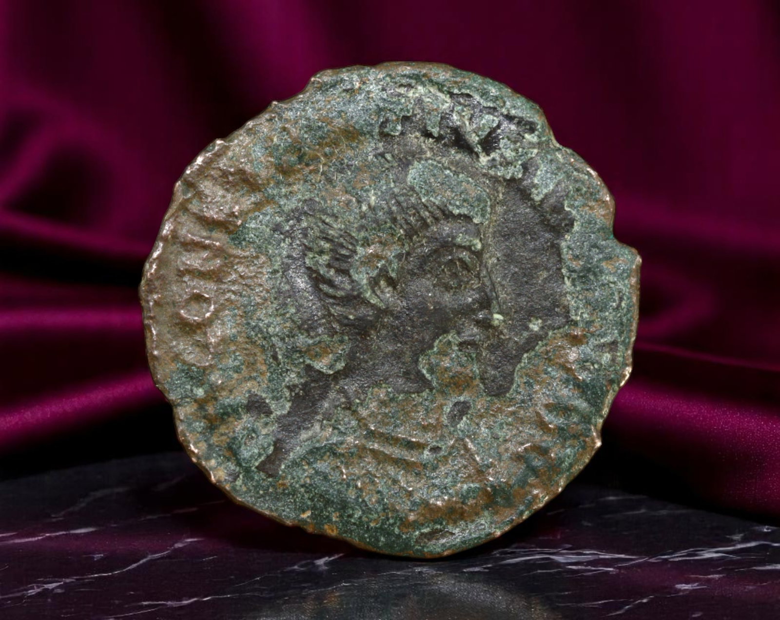 ROMAN EMPIRE: Ancient AE Coin Bronze Issue, 19mm: Issued during one of the most transformative epochs of the Roman Empire, this bronze coin embodies the endurance and adaptability of Roman statecraft across centuries. Its compact flan and timeworn su