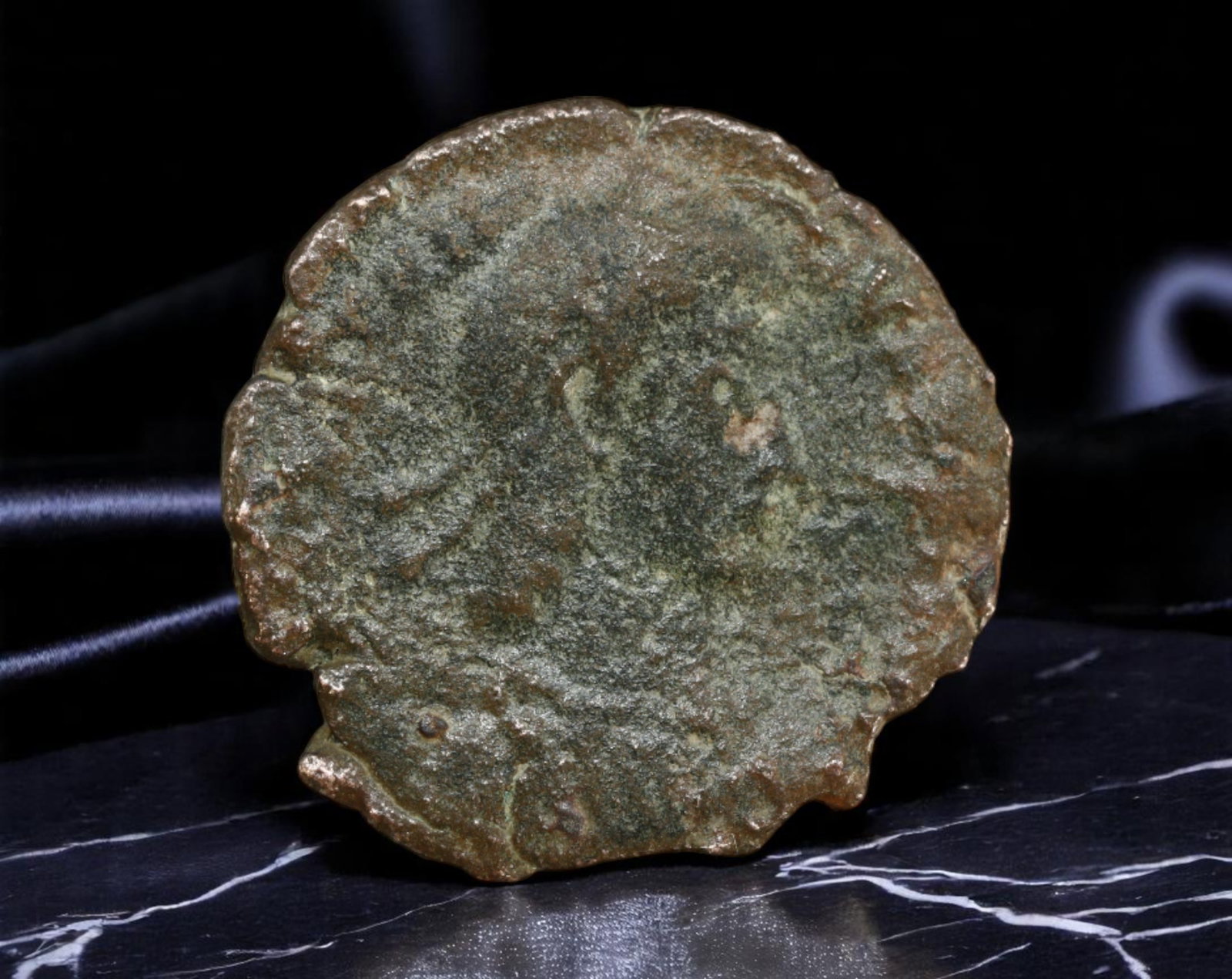 ROMAN EMPIRE: Ancient AE Coin Bronze Issue, 18mm: Issued during one of the most transformative epochs of the Roman Empire, this bronze coin embodies the endurance and adaptability of Roman statecraft across centuries. Its compact flan and timeworn su