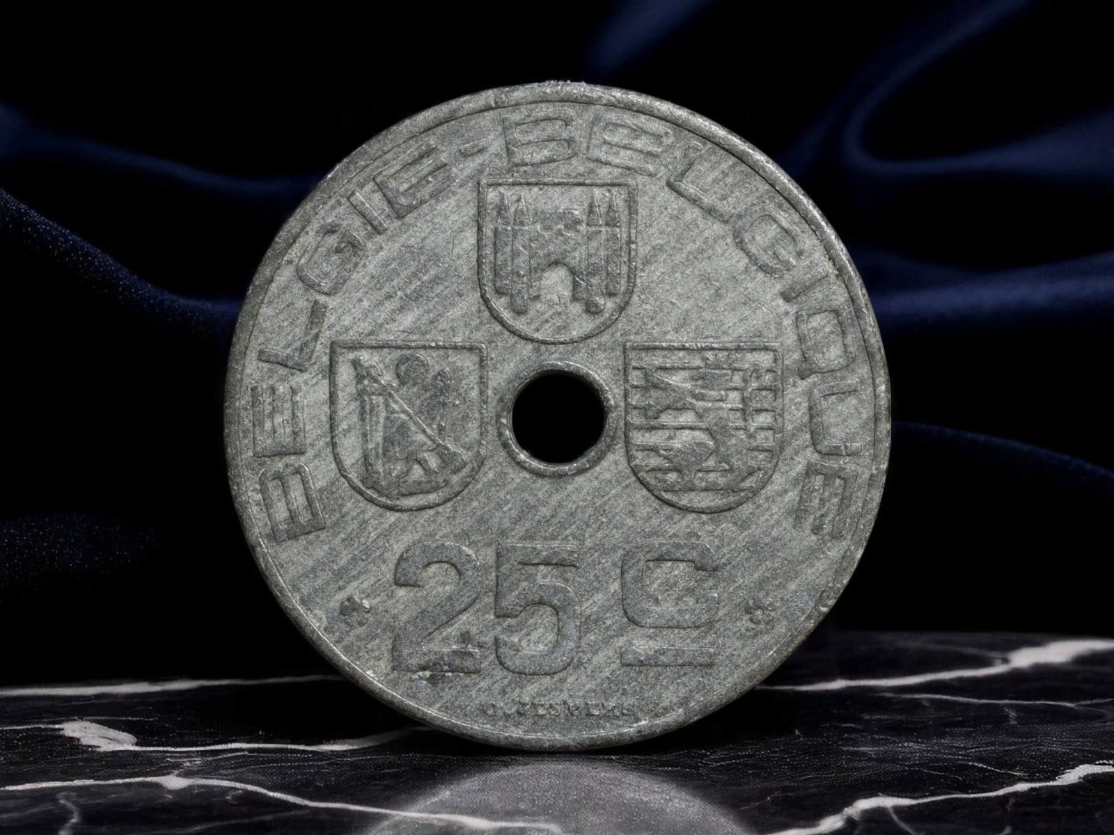 BELGIUM: Wartime Federal Identity - 25 Centimes Coin, 1944, 25mm: Struck during the German occupation of Belgium in 1944, this 25 Centimes coin offers a rare numismatic glimpse into the fraught symbolism of federal identity under duress. The obverse showcases three 