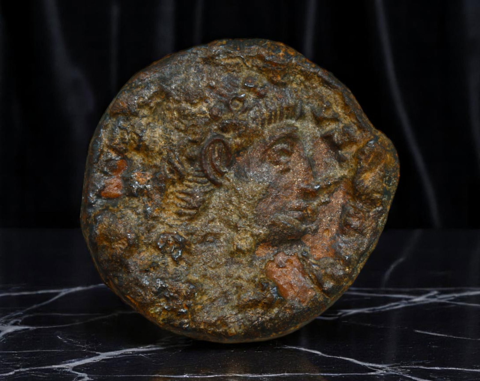 ROMAN EMPIRE: Ancient AE Coin Bronze Issue, 16mm: Issued during one of the most transformative epochs of the Roman Empire, this bronze coin embodies the endurance and adaptability of Roman statecraft across centuries. Its compact flan and timeworn su