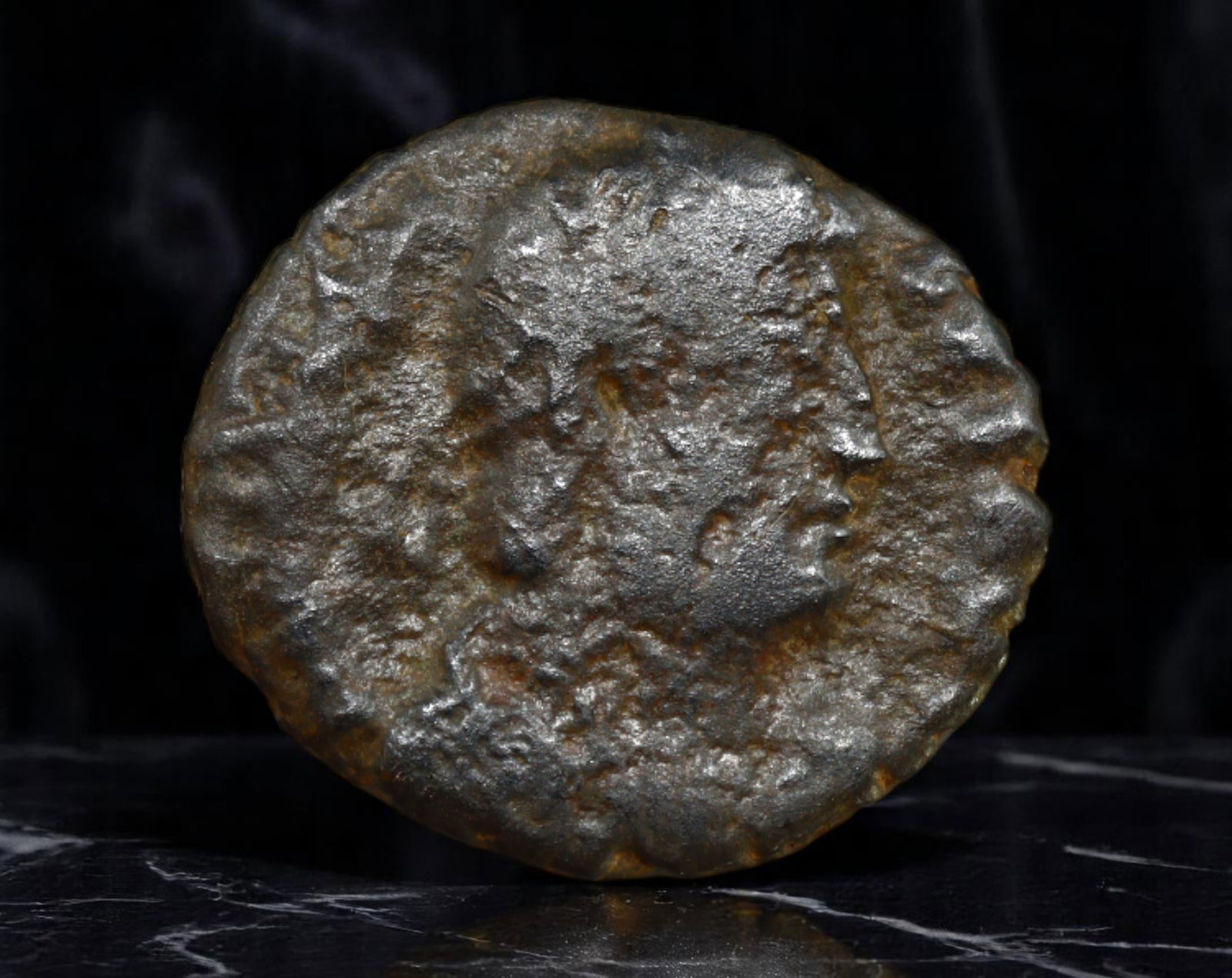 ROMAN EMPIRE: Ancient AE Coin Bronze Issue, 17mm: Issued during one of the most transformative epochs of the Roman Empire, this bronze coin embodies the endurance and adaptability of Roman statecraft across centuries. Its compact flan and timeworn su