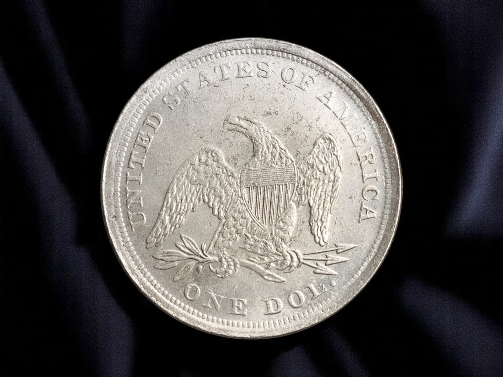 UNITED STATES: Liberty Seated - Heraldic Eagle One Dollar Coin (Modern Striking), 1847 Style, 37mm: Rendered in the enduring image of antebellum America, this modern striking pays tribute to the iconic 1847 Liberty Seated dollar, one of the defining motifs of U.S. monetary heritage. The obverse pres