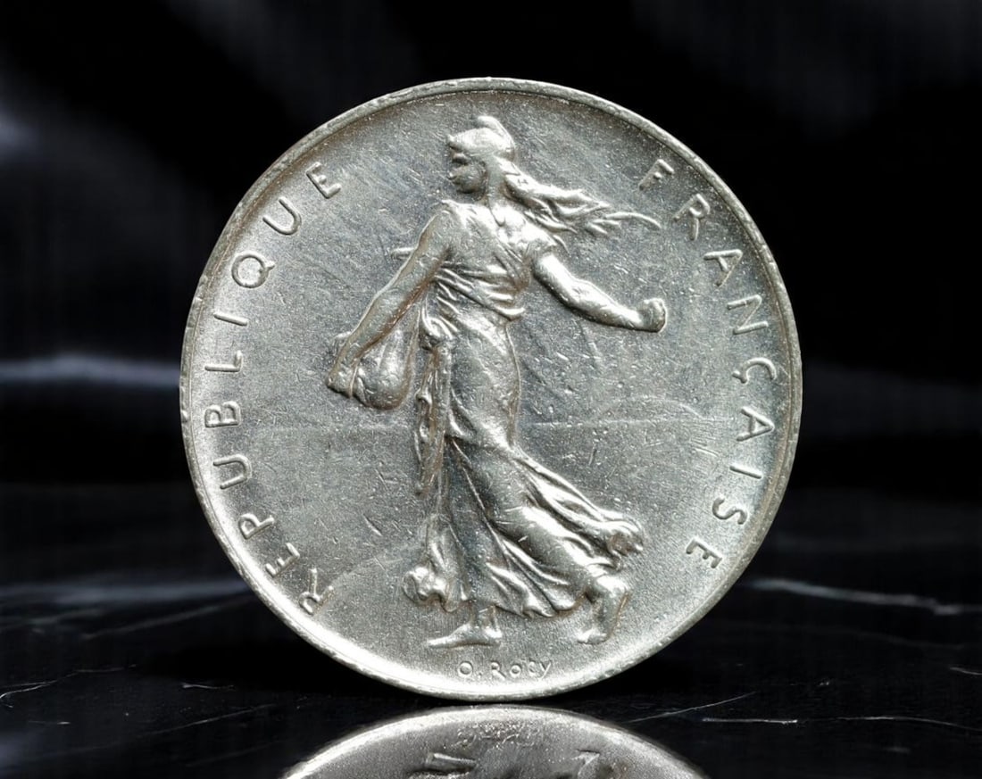 FRANCE: Republican Virtue - Sower & Olive Branch 1 Franc Coin, 1960, 24mm: Struck at the dawn of France's Fifth Republic, this 1960 1 Franc coin captures the ideological spirit of post-war renewal and unity. Designed by Oscar Roty, the front features La Semeuse-the Sower-gra