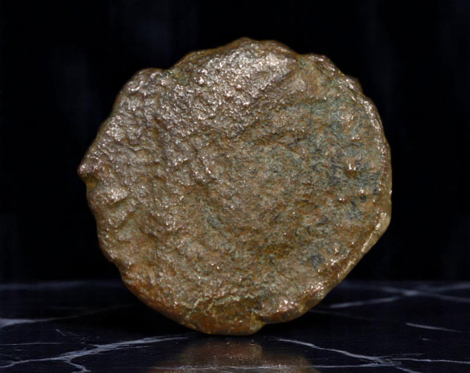 ROMAN EMPIRE: Ancient AE Coin Bronze Issue, 14mm: Issued during one of the most transformative epochs of the Roman Empire, this bronze coin embodies the endurance and adaptability of Roman statecraft across centuries. Its compact flan and timeworn su