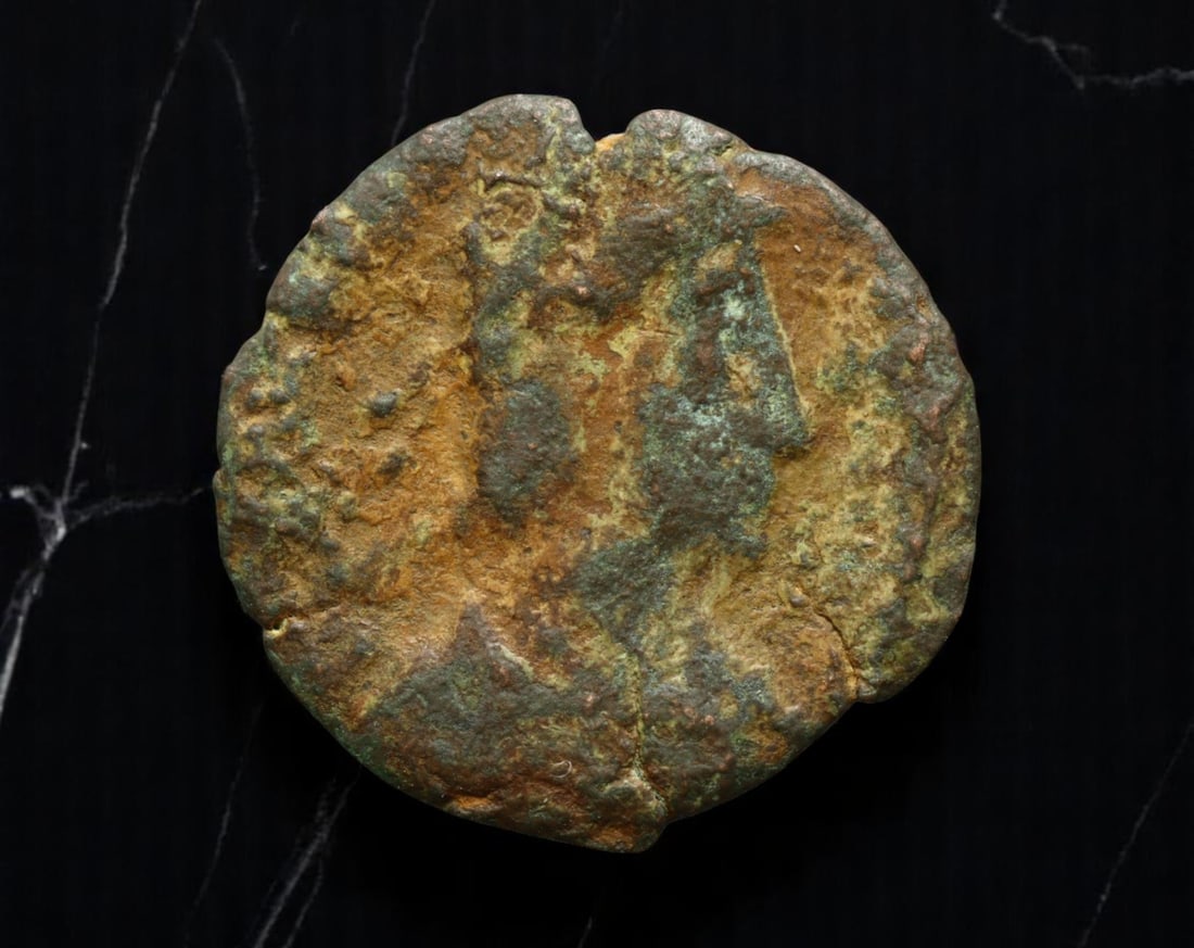 ROMAN EMPIRE: Ancient AE Coin Bronze Issue, 16mm: Issued during one of the most transformative epochs of the Roman Empire, this bronze coin embodies the endurance and adaptability of Roman statecraft across centuries. Its compact flan and timeworn su