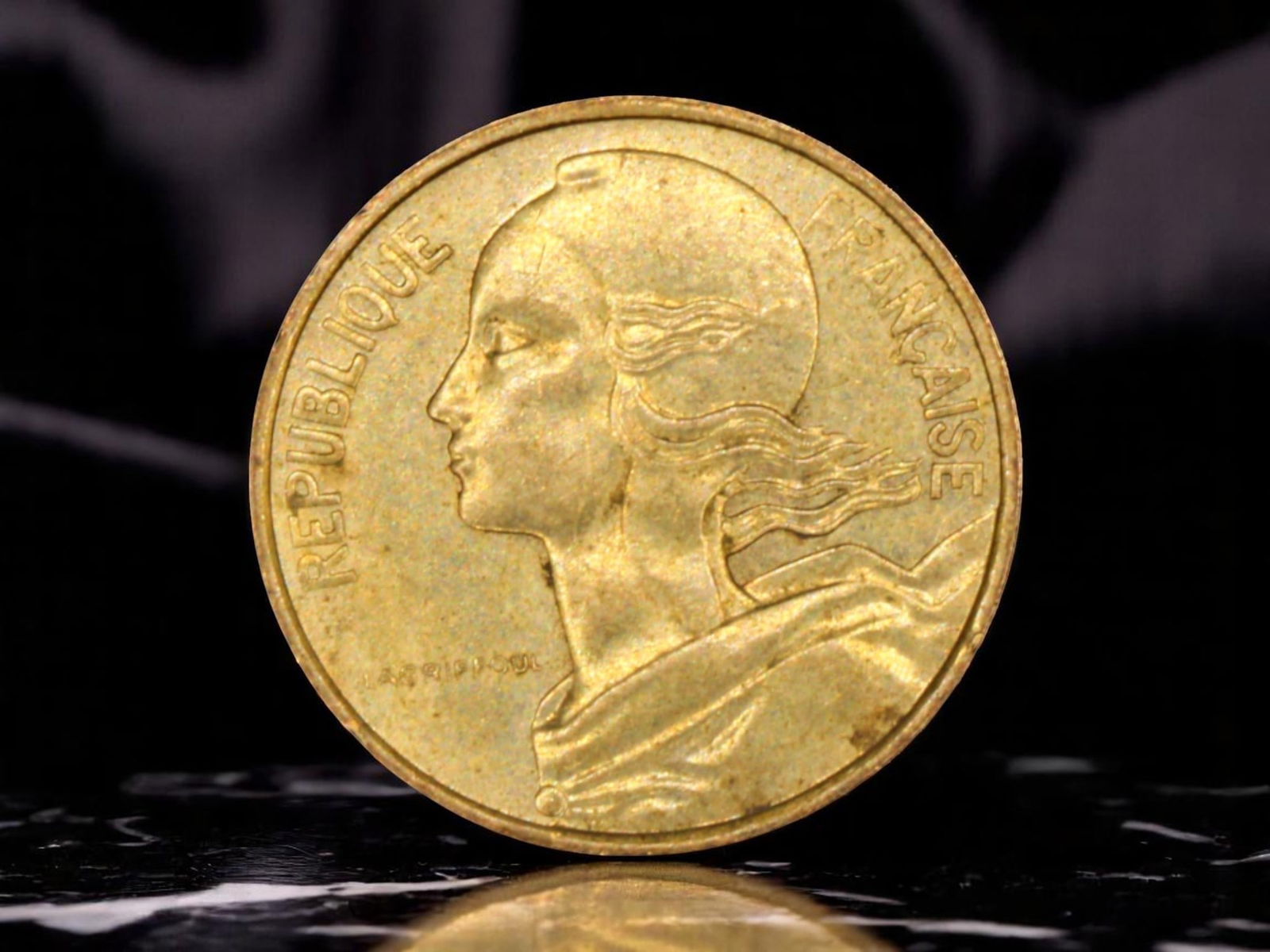 FRANCE: Republic Allegory - Marianne Civic Virtue 10 Centimes Coin, 1977, 19.7mm: Issued under the enduring ethos of the French Republic, this 1977 10 Centimes coin boldly echoes the revolutionary triad of Liberte, Egalite, Fraternite. The reverse presents agricultural abundance th