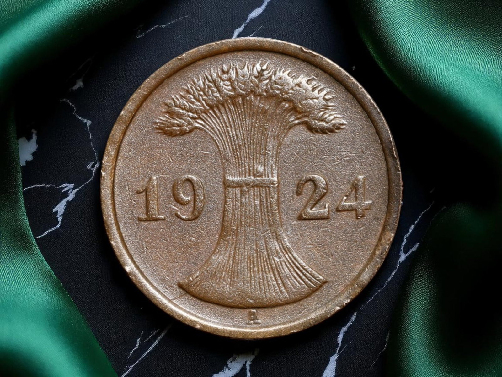 GERMANY/WEIMAR REPUBLIC: Wheat Sheaf 2 Rentenpfennig Coin, 1924 A Berlin Mint, 20mm: Issued during Germany's dramatic post-hyperinflation recovery, this 2 Rentenpfennig coin from 1924 stands as a minimalist yet potent emblem of national regeneration through agrarian stability. The whe