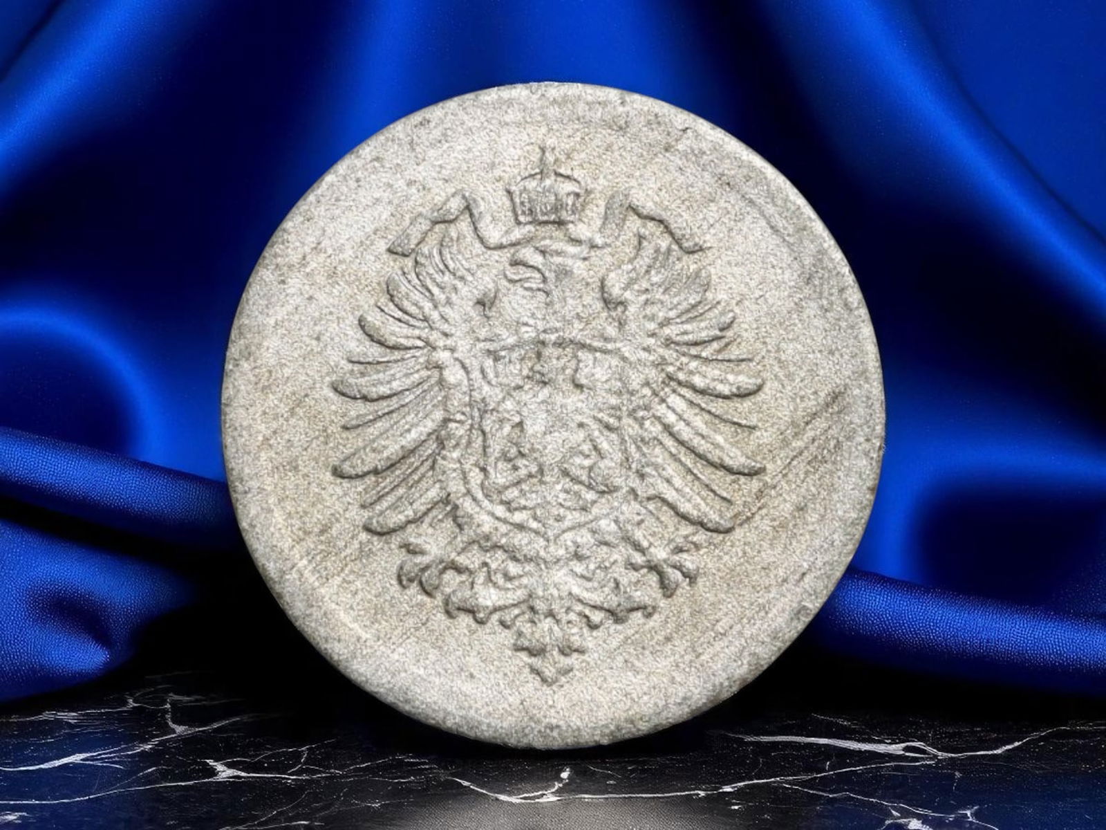 GERMANY/IMPERIAL: Wartime Authority - Imperial Eagle 1 Pfennig Coin, 1917, 16mm: Issued amid the turmoil of World War I, this 1917 1 Pfennig coin captures the final phase of Imperial German monetary policy under the Second Reich. The obverse features the imposing crowned imperial