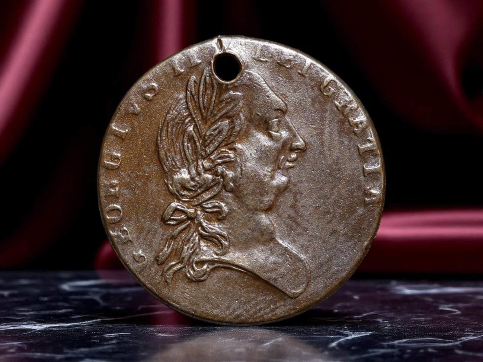 GREAT BRITAIN: George III - Royal Arms Jeton, 1788, 20mm: Struck at the cusp of revolution abroad and reform at home, this 1788 jeton commemorates King George III's enduring reign and Britain's constitutional monarchy. The obverse displays a laureate bust of