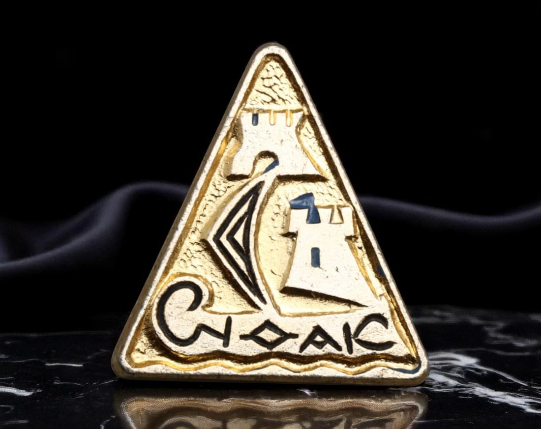 USSR: Sudak - Fortress and Sail Commemorative Badge, circa 1970s, 22mm: This distinctive triangular badge, measuring 22mm, captures the silhouette of the ancient Sudak Fortress rising boldly along the Black Sea coast. The stylized sail and fortress motif embodies the mari