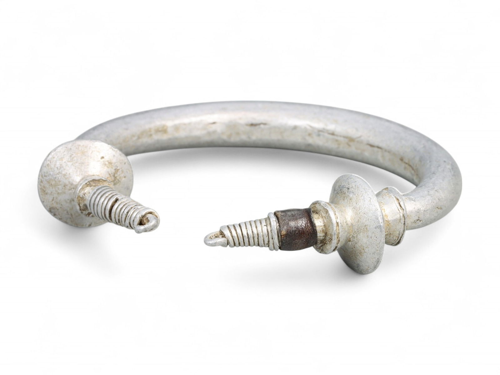 Post-Medieval Tuareg Conical Finial Aluminum and Leather Bracelet, West Africa, c. 19th Century CE (1 of 2)
