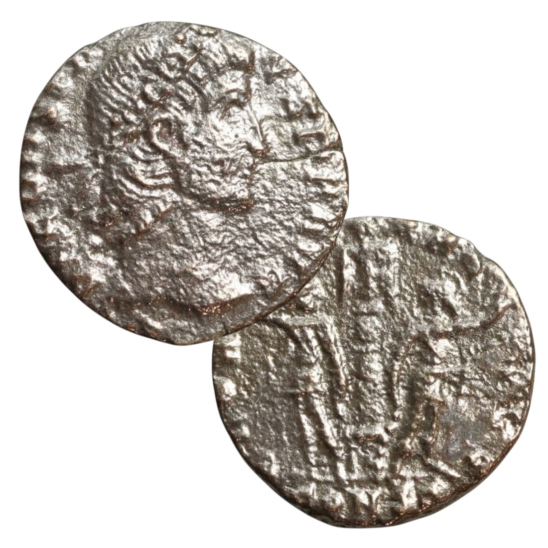 ANCIENT ROMAN EMPIRE: Ancient AE Bronze Coin Issue, 15mm: Issued during one of the most transformative epochs of the Roman Empire, this bronze coin embodies the endurance and adaptability of Roman statecraft across centuries. Its compact flan and timeworn su