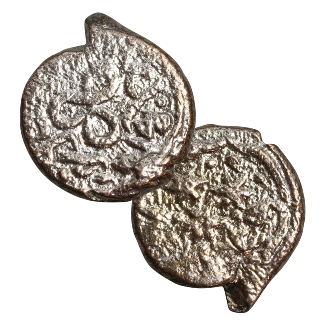 Ancient Medieval Mongol Empire Copper Coin, Arabic Inscription Type, c. 13th-14th Century CE: This compact copper coin, originates from the height of the Mongol Empire's expansion into the Islamic world, likely minted between the late 13th and early 14th century CE. The piece bears Arabic insc