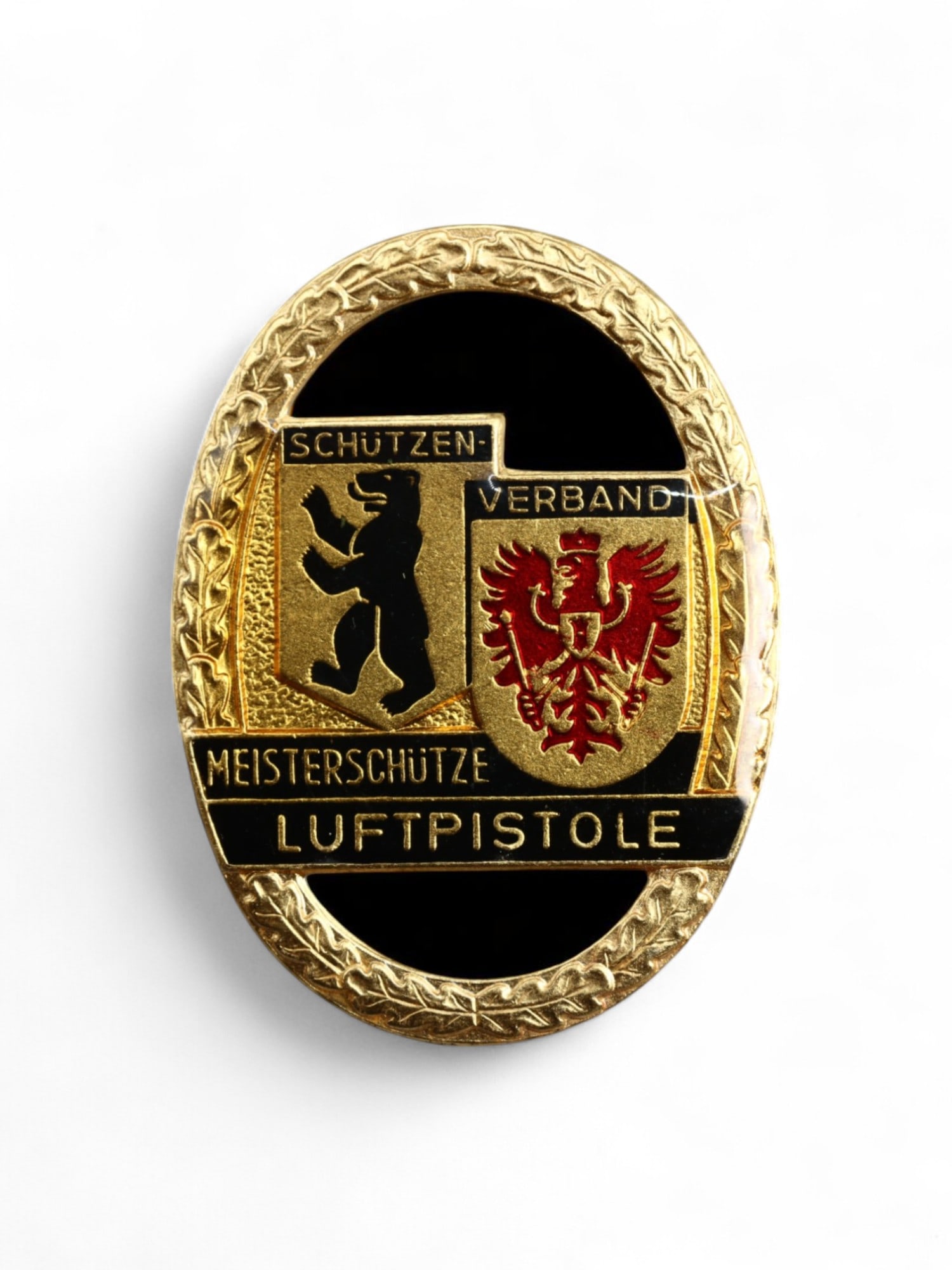 MID-CENTURY GERMAN: Marksman Badge Brooch - Luftpistole Champion Insignia, 5x3.8cm: A mid-century German shooting award badge crafted by Deumer Ludenscheid, this piece bears the inscription "MEISTERSCHUTZE LUFTPISOLE" and displays the heraldic bear and eagle insignias under the Schut