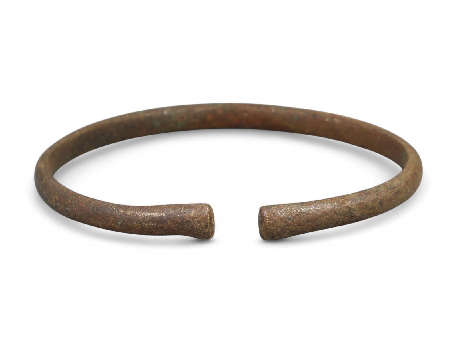 Ancient Roman Minimalist Armillae Bronze Bracelet, c. 1st-3rd Century CE: This elegantly simple bronze bracelet, dating to the Roman Imperial era between the 1st and 3rd century CE, is a refined example of utilitarian Roman adornment. Belonging to a broader tradition of "ar