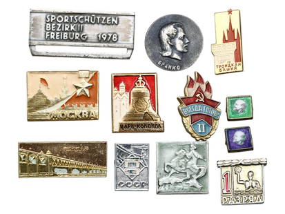 Cold War Era USSR & East Bloc Badge Collection Propaganda, Architecture, Leninism & Sport, 1960-1980: This visually diverse set of twelve metal and enamel badges showcases the ideological, architectural, and cultural fabric of the Soviet Union and its Eastern Bloc allies during the height of Cold War