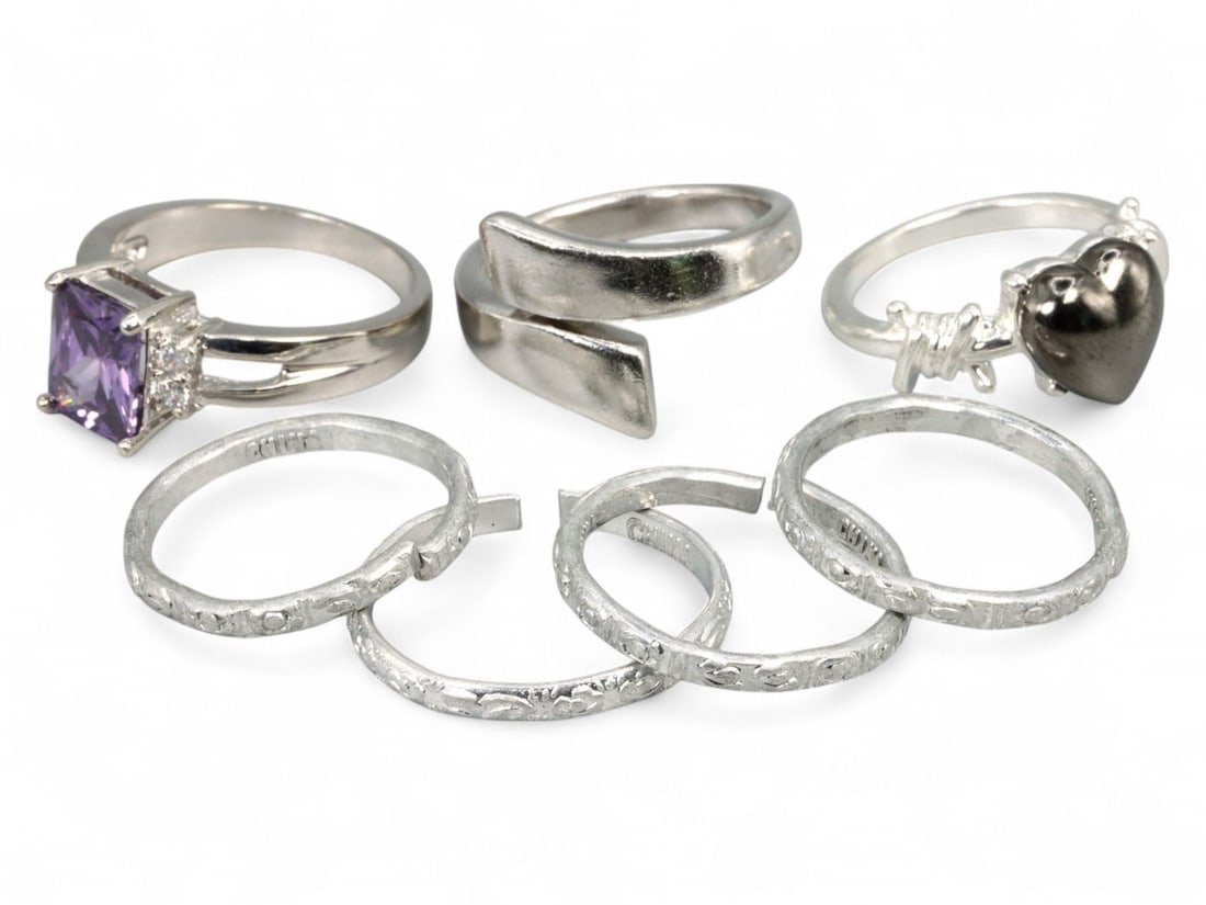 Timed Lot Auction - Estate Ring Collection in Mixed Styles and Materials, Sold As Is: This curated estate lot presents a rich and varied selection of rings spanning multiple styles, materials, and periods of craftsmanship. Offered as a group exactly as photographed, this lot contains n
