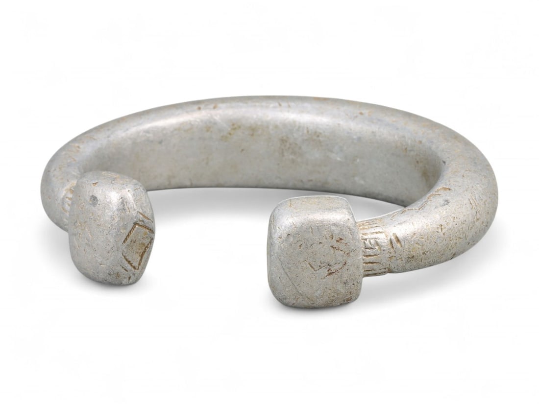Post-Medieval West African Geometric Terminal Aluminum Currency Bracelet, c. 18th-19th Century CE (1 of 2)