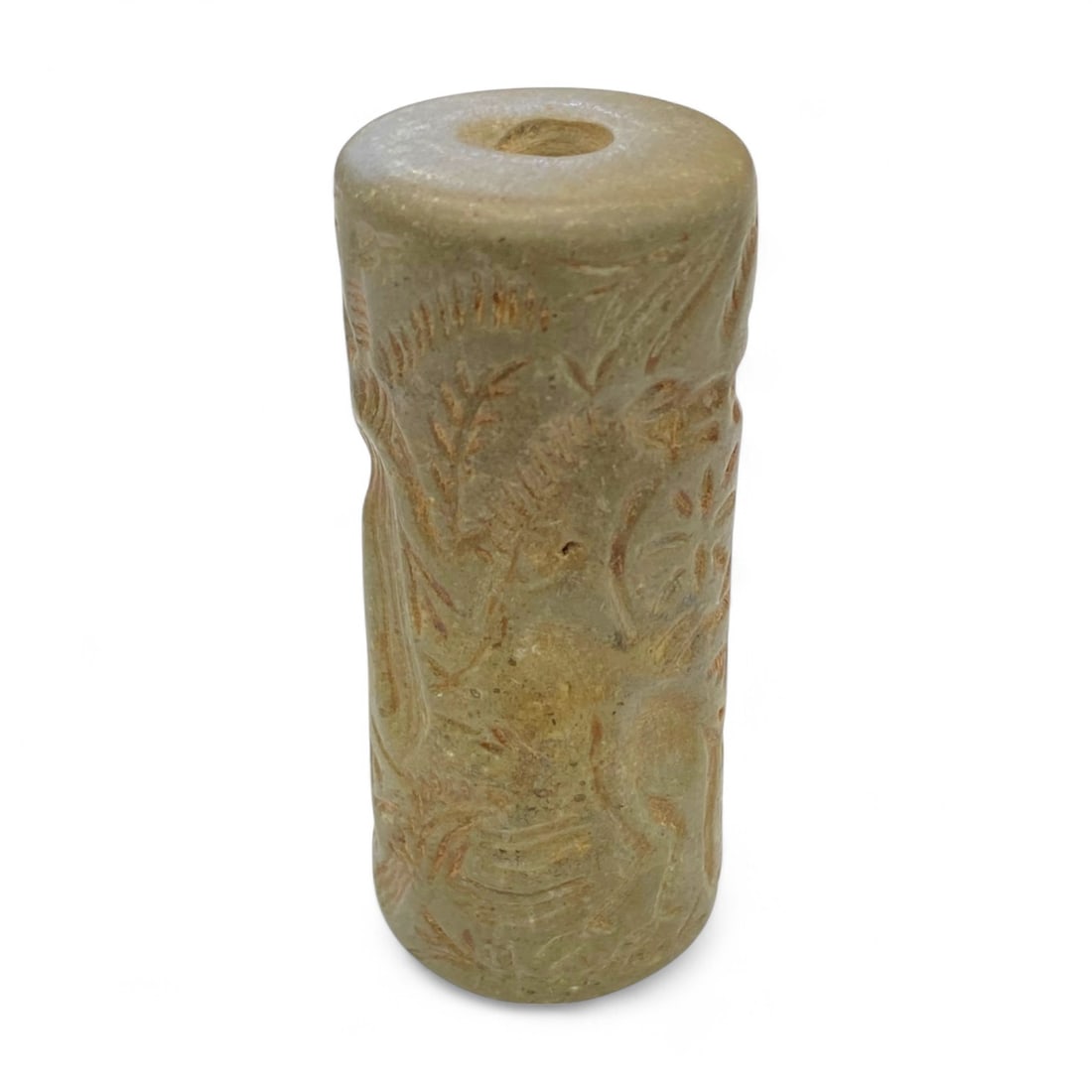 Ancient Mesopotamian Green Stone Cylinder Seal with Ritual Scene, c. 2nd Millennium BCE - 75g: This authentic Mesopotamian cylinder seal, carved from a finely polished green stone, stands as a relic of ancient communication, ritual, and social identity. Dating to the 2nd millennium BCE-likely f