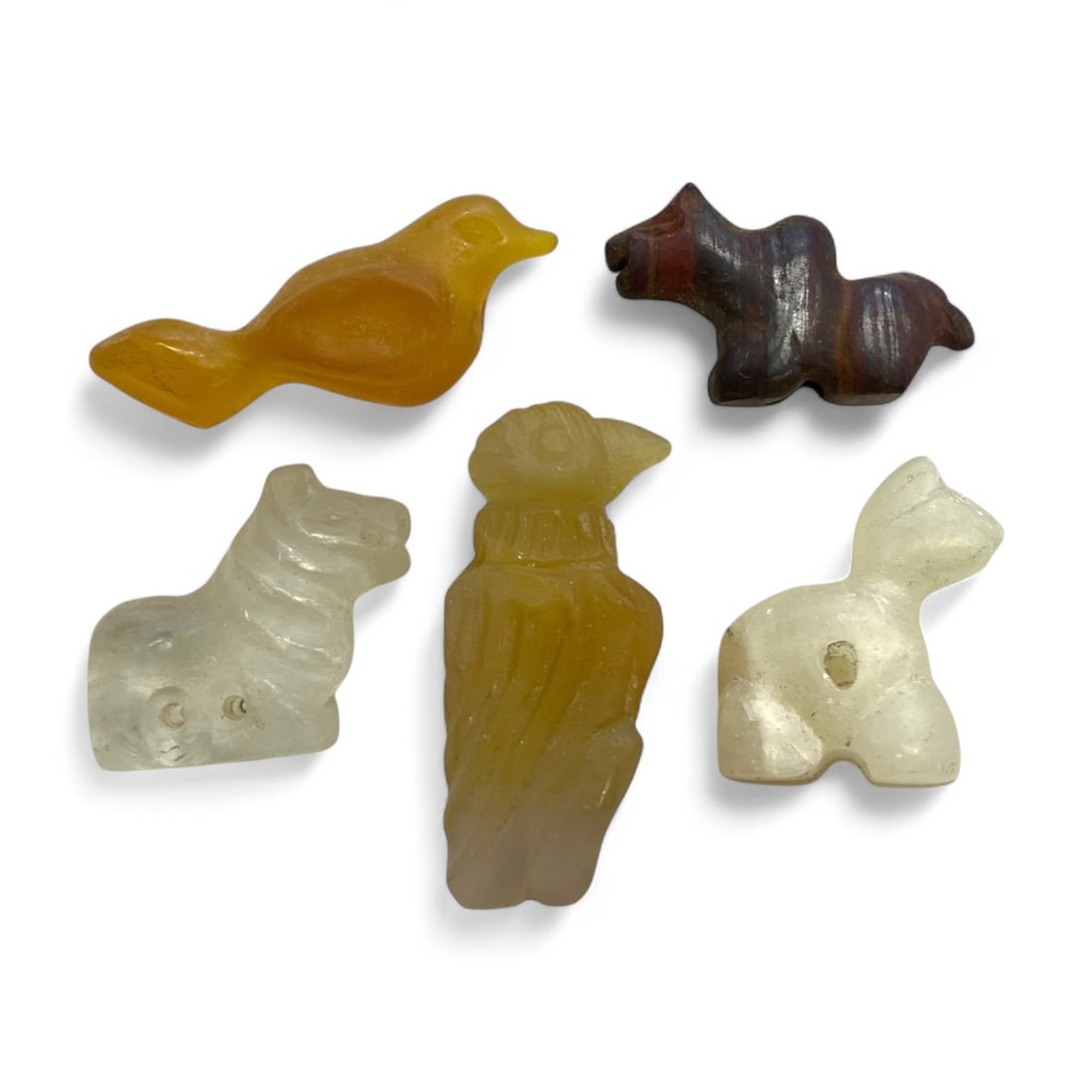 Ancient Near Eastern Zoomorphic Chalcedony Amulet Collection, c. 1st-2nd Millennium BCE, 27g: This rare ensemble of five carved animal amulets from the Ancient Near East captures the spiritual essence and symbolic language of early civilizations through miniature artistry. Dating between the 2