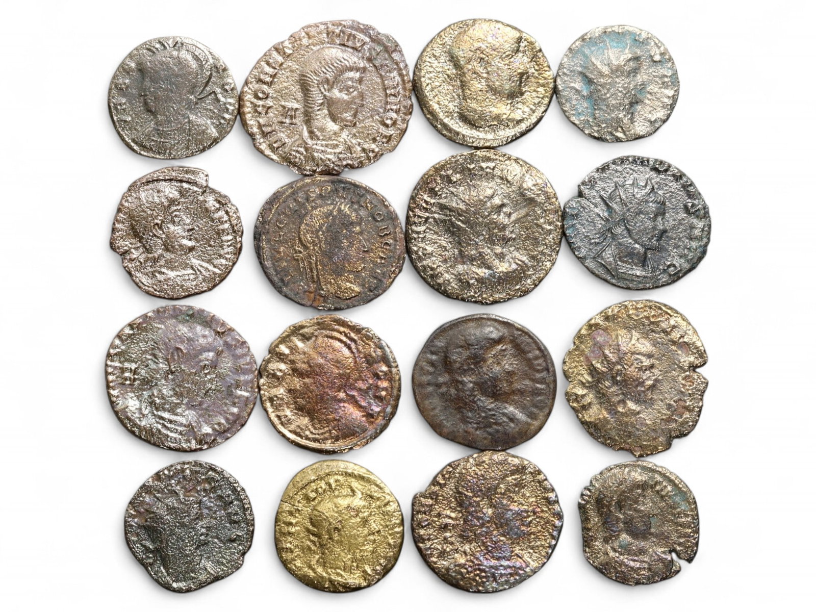 Ancient Roman 16-Coin Bronze Ensemble of Imperial Motifs, c. 3rd-4th Century CE, 39g: This elegant group of 16 ancient Roman bronze coins, collectively weighing 39 grams (1.38 oz), embodies the fusion of political power and religious symbolism that defined Rome's imperial coinage. Stru