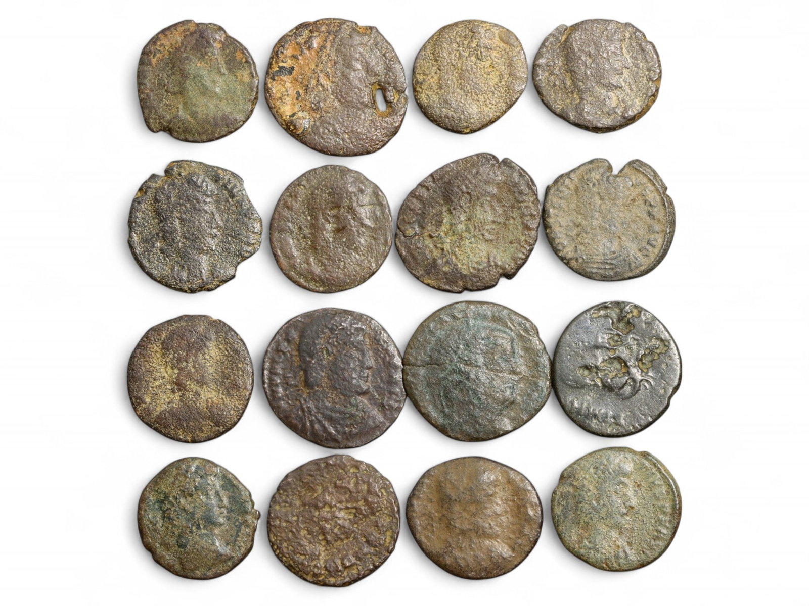 Ancient Roman 16-Coin Bronze Lot Depicting Deities and Emperors, c. 3rd-4th Century CE, 29g: This curated set of 16 ancient Roman bronze coins, weighing a total of 29 grams (1.02 oz), provides a compelling glimpse into the iconography and propaganda of the later Roman Empire. Minted between t