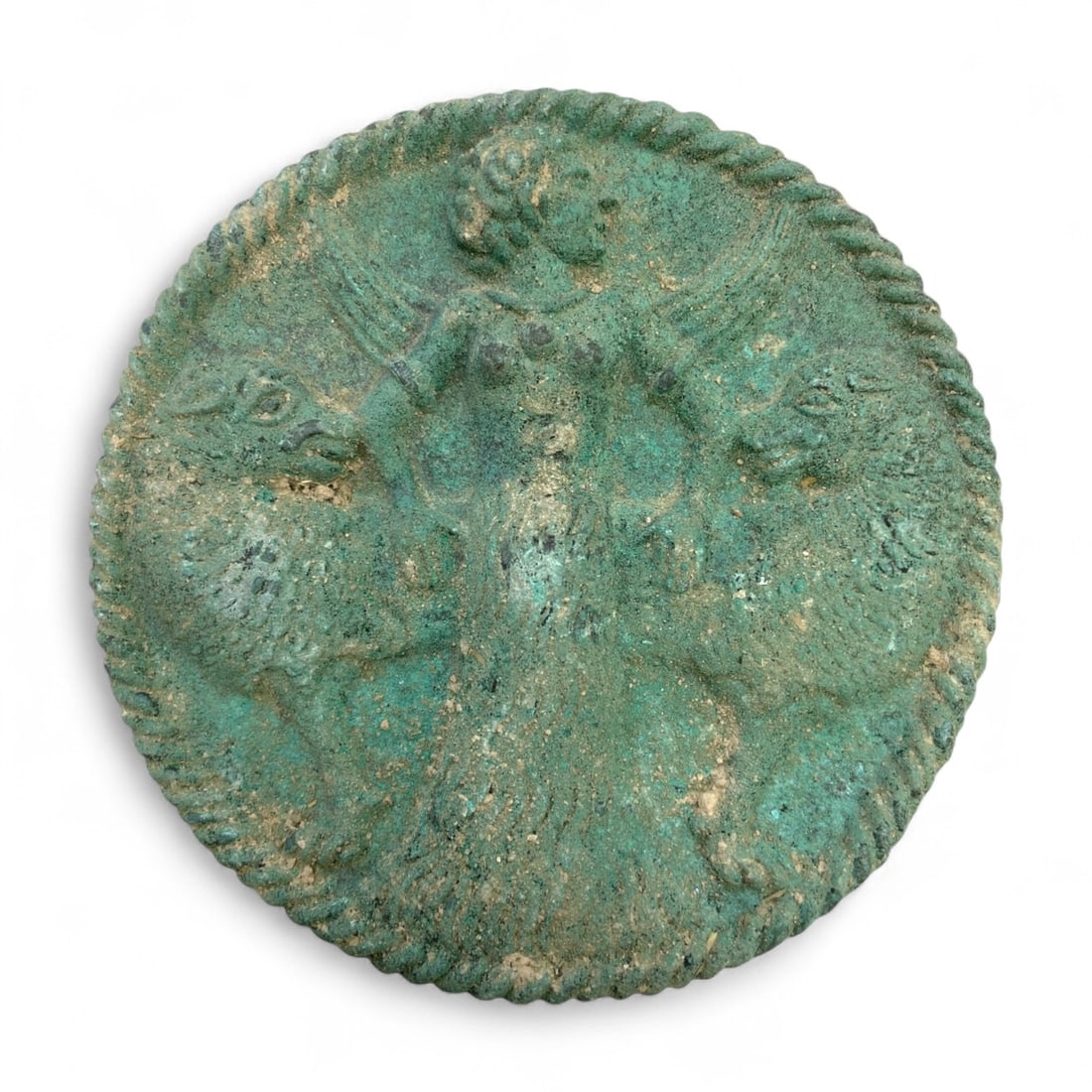 Ancient Roman Bronze Medallion of Winged Goddess with Beasts, c. 1st-3rd Century CE, 225g: This powerful and visually arresting bronze medallion depicts a winged goddess-likely Victoria, Venus, or a syncretic deity-flanked by two rearing beasts, possibly lions or panthers, representing domi