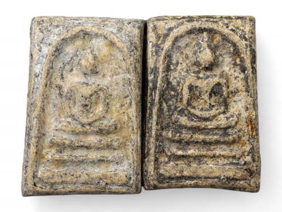 Thai Temple Amulets in Aged Stone Clay, Twin Buddha Reliefs, c. Early 20th Century, 19g: This austere and meditative pair of Thai Buddhist amulets, each measuring approximately 3.8 cm in height, exemplifies the quiet dignity and spiritual strength embedded in the sacred craft of votive ta