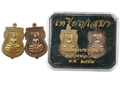 Thai Bronze Twin Medallions of Phra Buddha, Wat Phon Sawai Issue, 2559 BE, 24g: This elegant pair of Thai bronze medallions, known as "Rian Phra Samah," embodies the sacred Buddhist tradition of casting commemorative amulets for merit-making and protective blessings. Produced in
